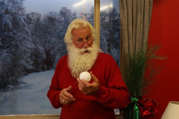 red sled santa with ball