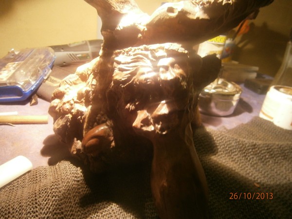 Progression of tree stump carving
