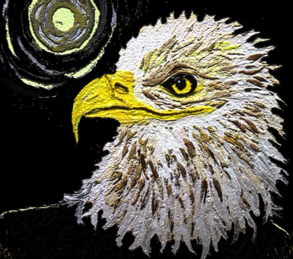 The proud eagle overlooking the dark moonlit night