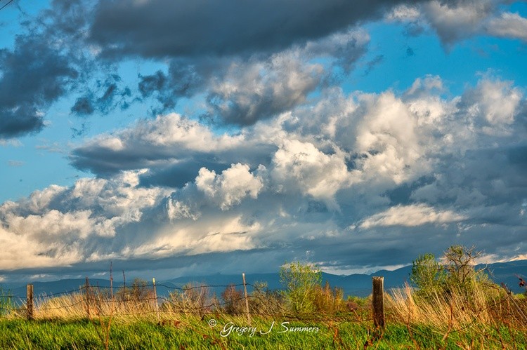 Spring Clouds Over The Rockies