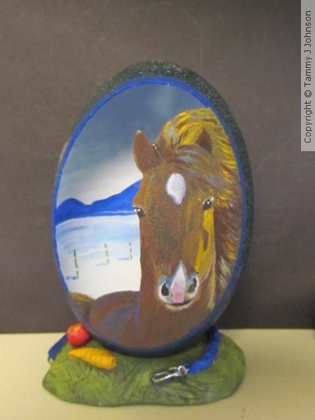 horse on emu egg.