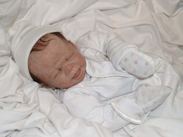 Sleeping baby boy Fussy or laughing?:)