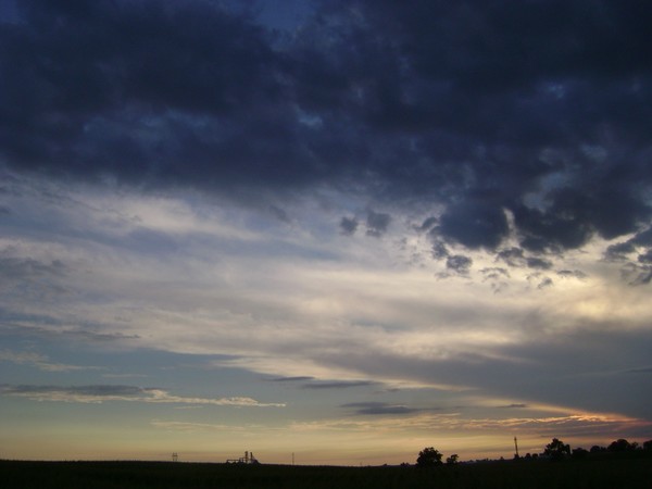 Storm Moveing on to the Sun Setting Sky