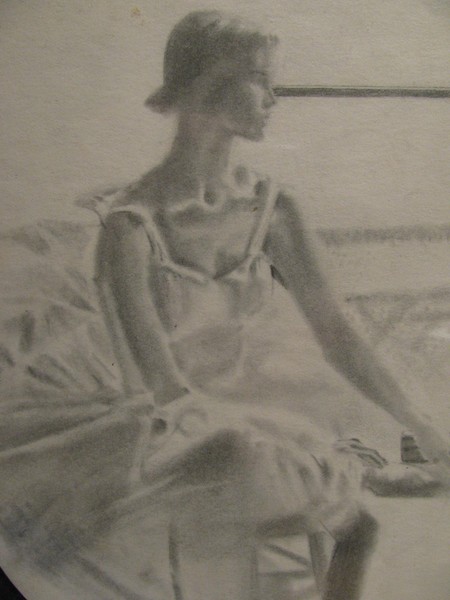 Young Woman Ballet Dancer Sitting on Chair   