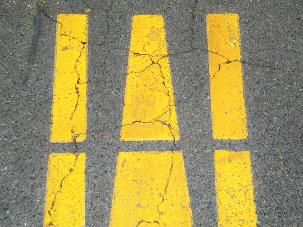 Three gold lines on Asphalt