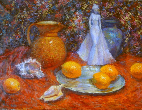 Still life with oranges and a statuette