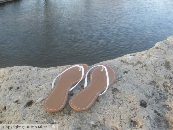 White Sandals On Rocks
