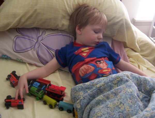 Little Boy Dreaming of Trains