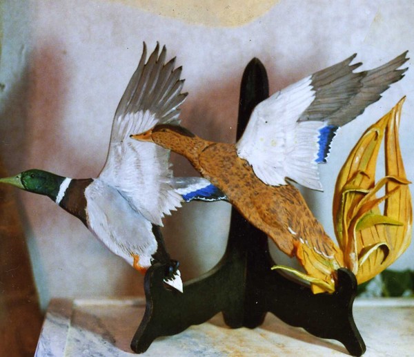 mallards on the wing, sculpture