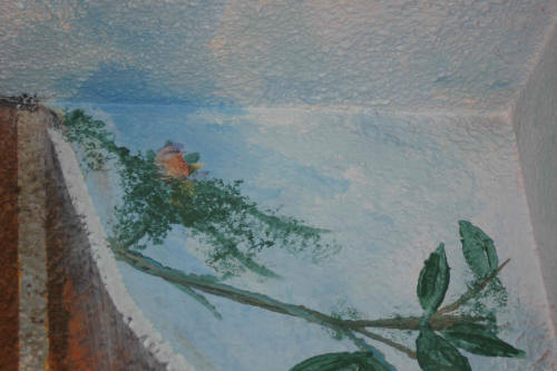 sky corner with bird and nest poking through