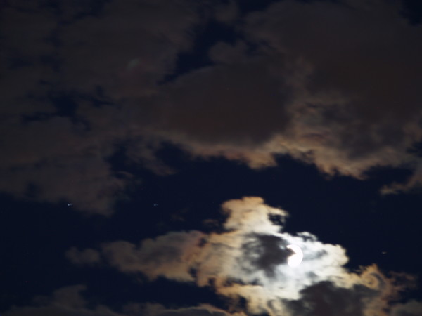 EERIE MOON LIT CLOUDS