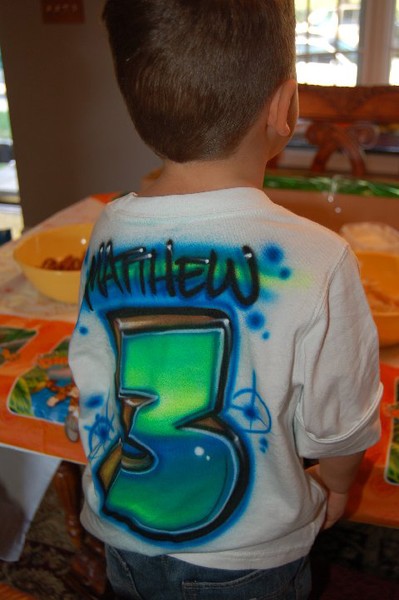 child wearing a airbrushed design
