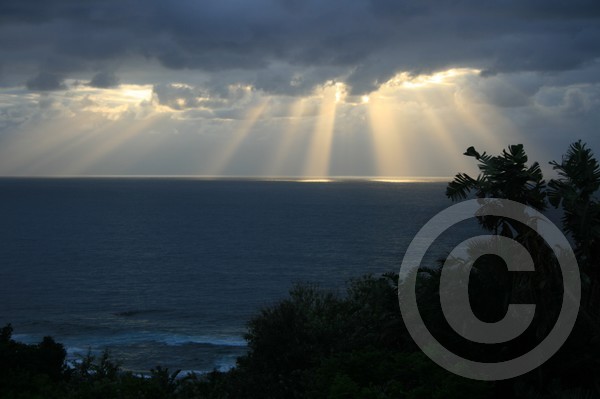 Spotlights on the sea at dawn