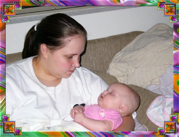 MOM LOOKING AT HER FIRST BORN