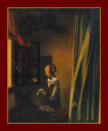 Lady reading letter