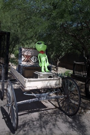 Alien on a Buckboard Wagon