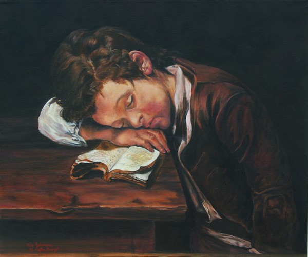 schoolboy sleeping on his book