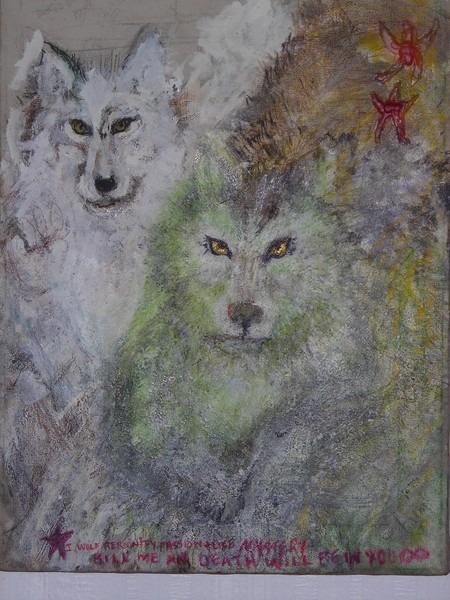 2 Wolves one white one brown Jumping out at you