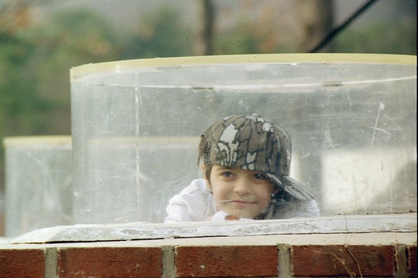 Turtleback Zoo, Boy With Hat.