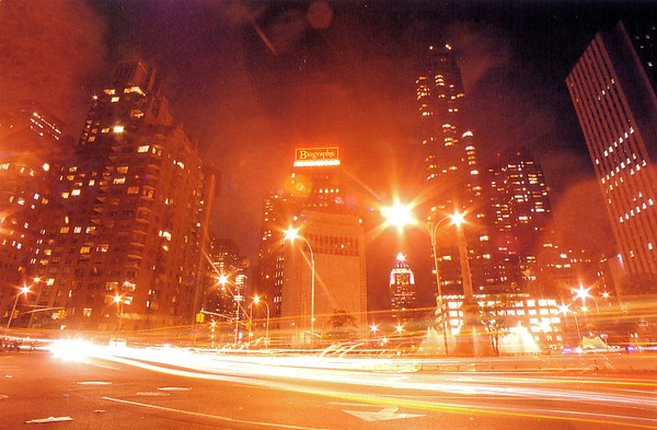 MID-MANHATAN AT NIGHT