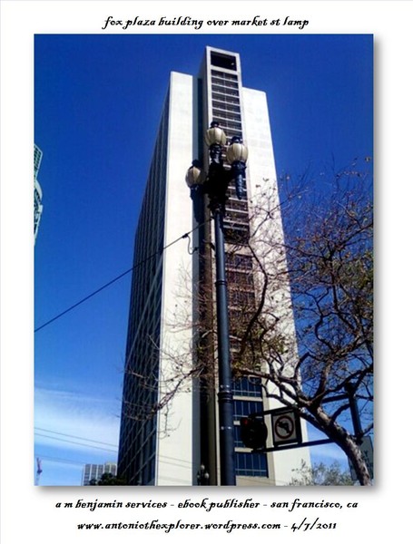 fox plaza building top over a street lamp