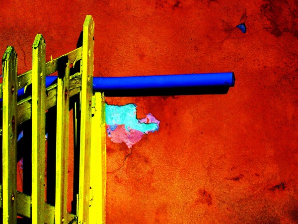Fence and blue pipe