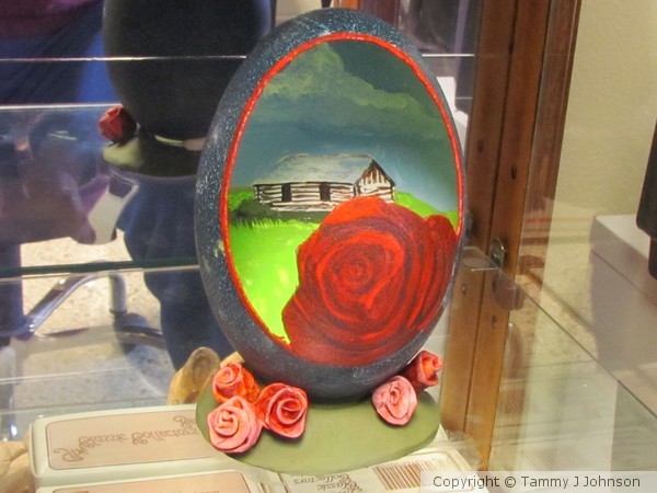 red rose and cabin 