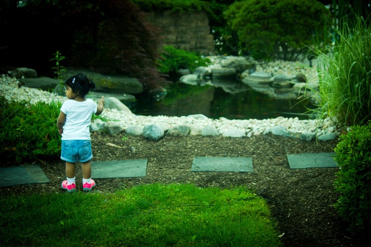 Child near a pond - photography