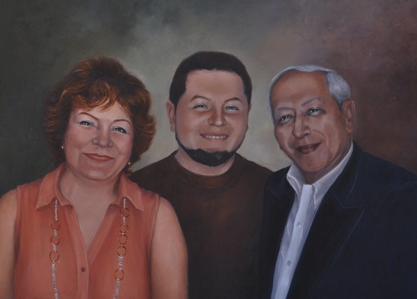 Dr. O. Robles, wife, and son.