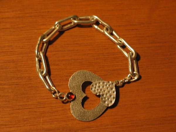 Handmade sterling bracelet with hart clasp &garnet