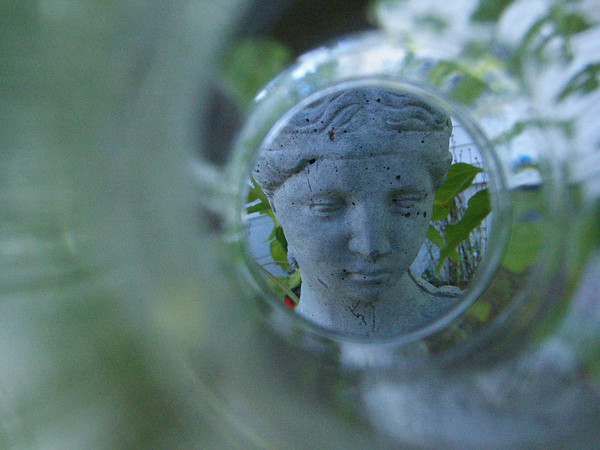 yard girl thru glass