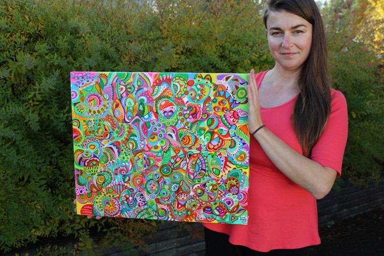 Artist Veera Zukova with her colorful abstract art, acrylic on canvas.