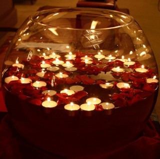 Floating candles and petals