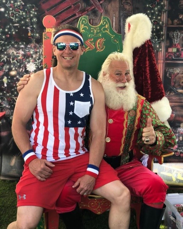 redsledsanta with man