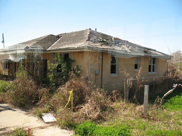 HOUSE DAMAGED IN HURRICANE YEAR'S LATER