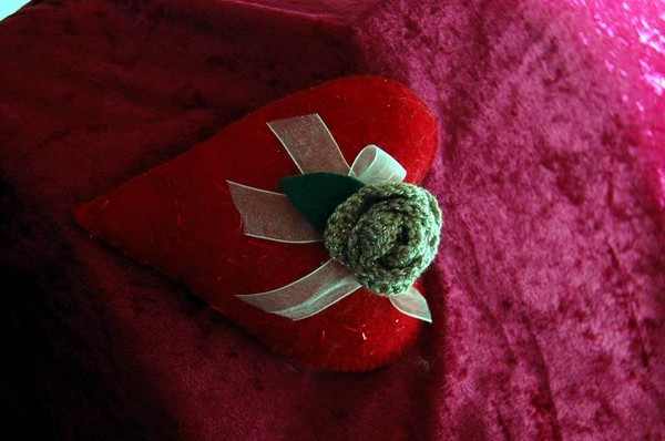 stuffed heart ornament with crochet flower
