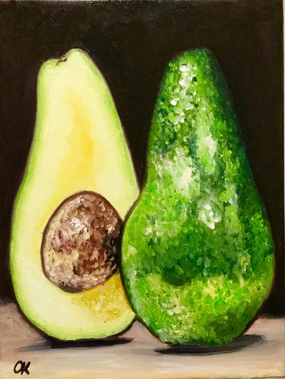 Avocado on the dark background. Still life .