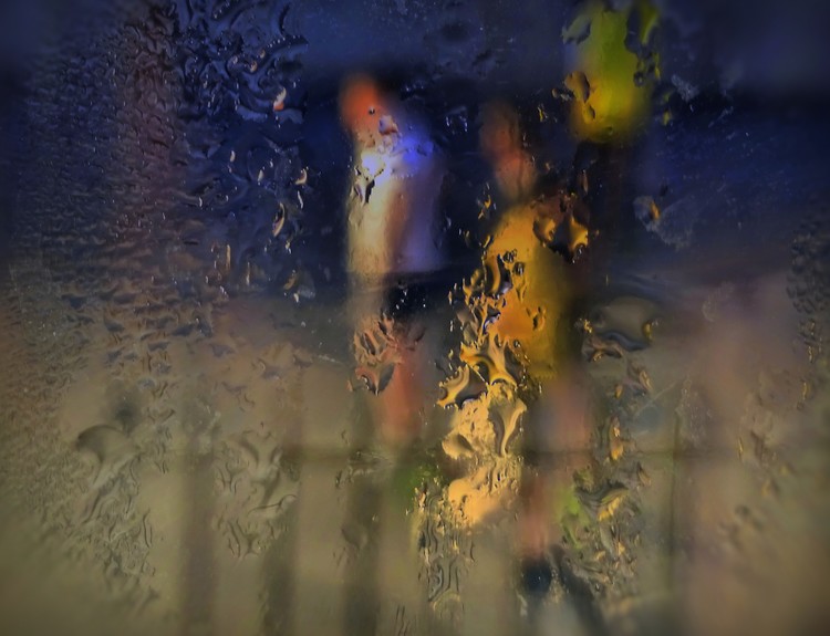 FOOTBALL IN THE RAIN