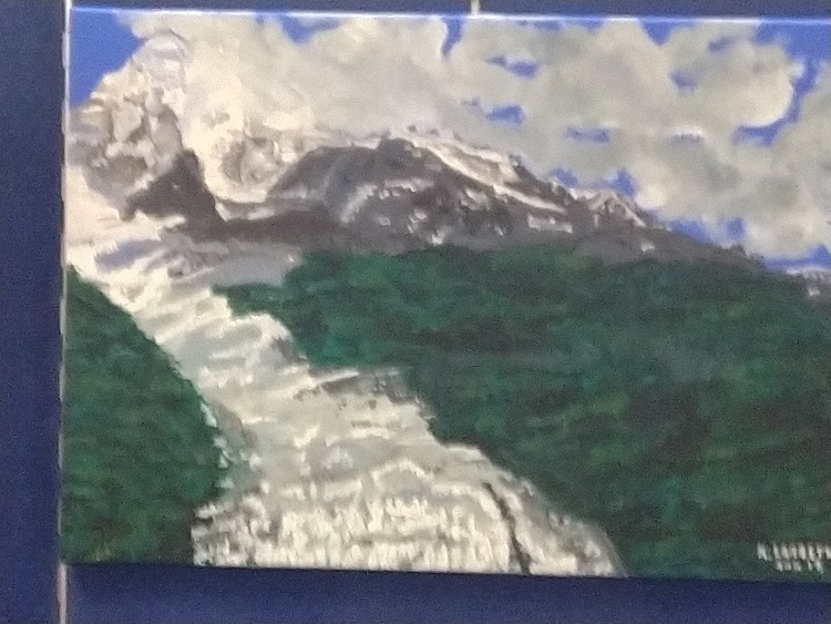 Mountain landscape with a glacier and forests