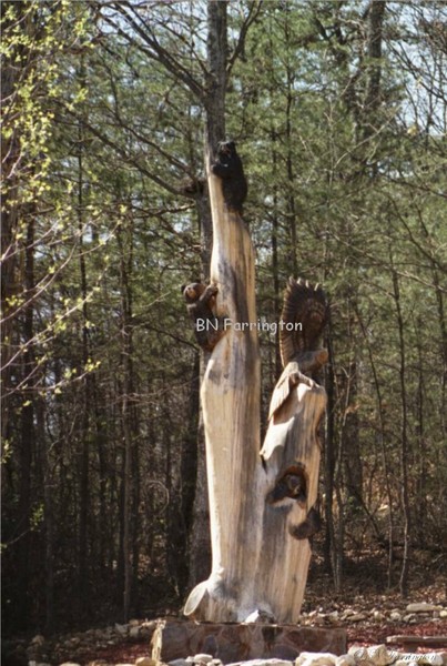 Totem with carved Bears and Eagle