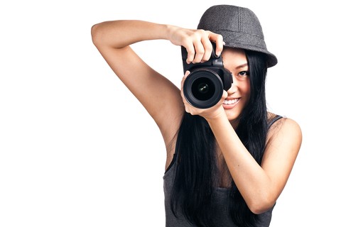 Young asian girl taking a photo- SmartPhotoEditors