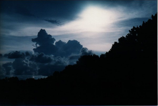 white light in a blue sky