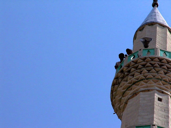 two men on minaret