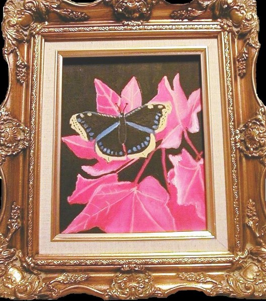 BUTTERFLY ON RED LEAFS