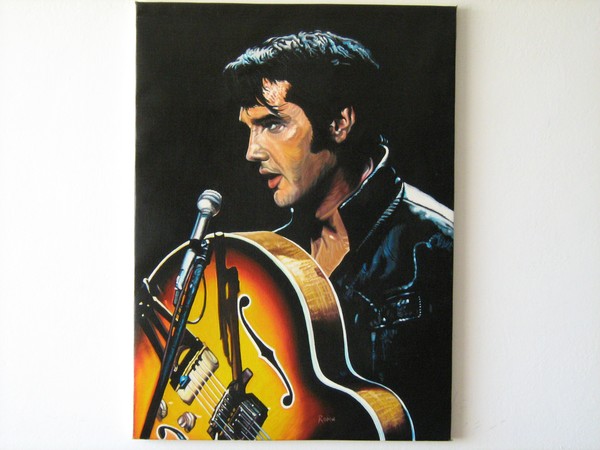 Elvis y su guitarra