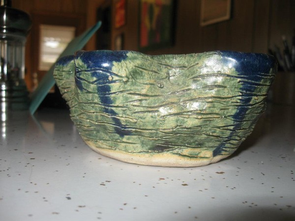 green and blue ceramic bowl