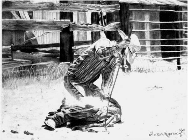 Cowboy branding calf