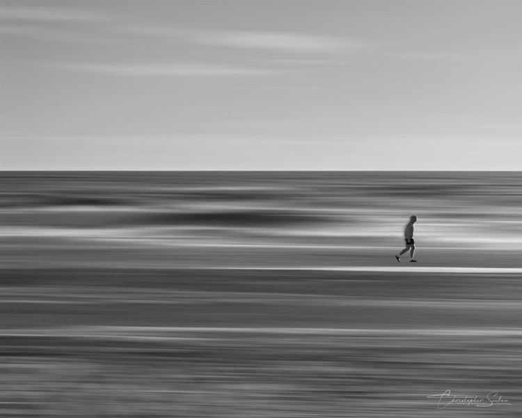 Walking along this lonely beach