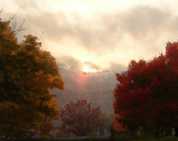 sunset over the hill