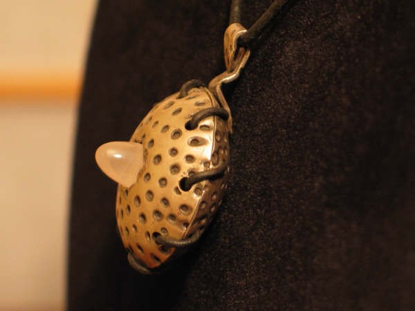 Sterling pendent w/rose quartz and leather